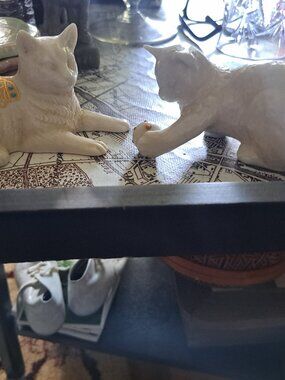 2 lenox Elegant white porcelain cat figurines. This set includes two distinct po